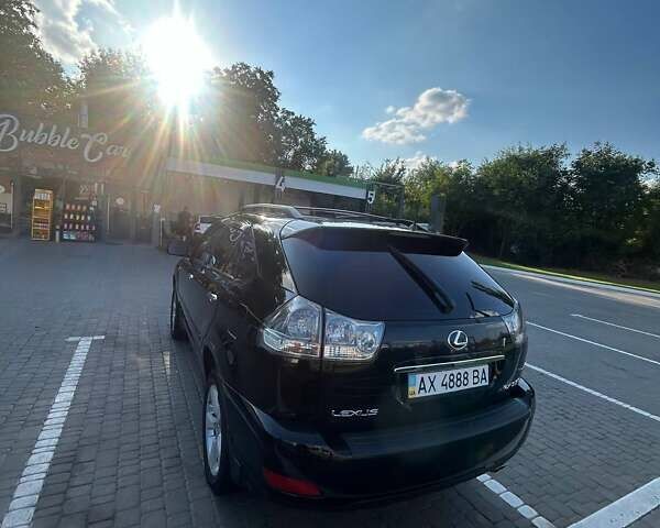 Черный Лексус РХ, объемом двигателя 3.46 л и пробегом 242 тыс. км за 14000 $, фото 5 на Automoto.ua