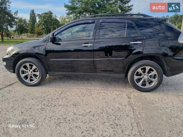 Черный Лексус РХ, объемом двигателя 3.5 л и пробегом 213 тыс. км за 10200 $, фото 33 на Automoto.ua