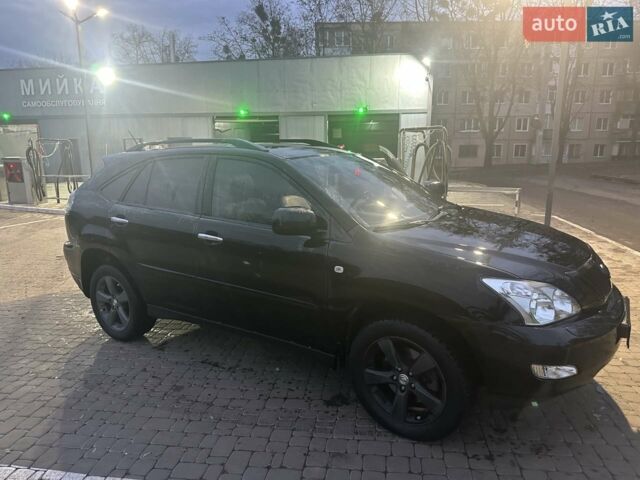 Чорний Лексус РХ, об'ємом двигуна 3.46 л та пробігом 167 тис. км за 11500 $, фото 1 на Automoto.ua