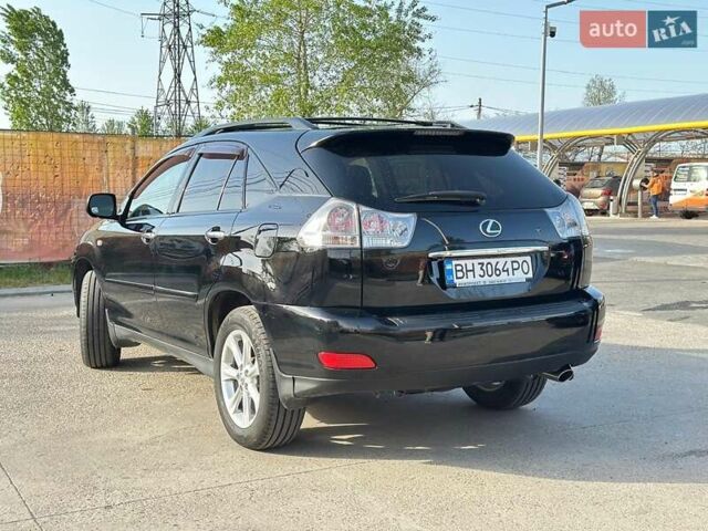 Черный Лексус РХ, объемом двигателя 3.46 л и пробегом 318 тыс. км за 13700 $, фото 1 на Automoto.ua