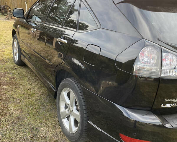 Черный Лексус РХ, объемом двигателя 3.46 л и пробегом 167 тыс. км за 13800 $, фото 4 на Automoto.ua