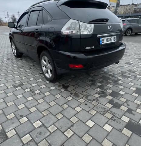 Черный Лексус РХ, объемом двигателя 3.46 л и пробегом 248 тыс. км за 11500 $, фото 3 на Automoto.ua