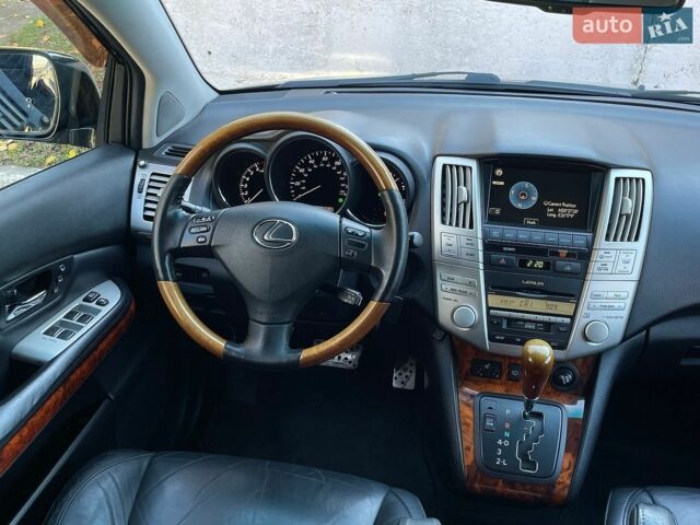 Черный Лексус РХ, объемом двигателя 3.5 л и пробегом 205 тыс. км за 11500 $, фото 28 на Automoto.ua