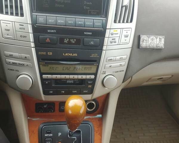 Черный Лексус РХ, объемом двигателя 3.46 л и пробегом 273 тыс. км за 11700 $, фото 22 на Automoto.ua