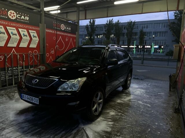 Чорний Лексус РХ, об'ємом двигуна 3 л та пробігом 379 тис. км за 7013 $, фото 1 на Automoto.ua