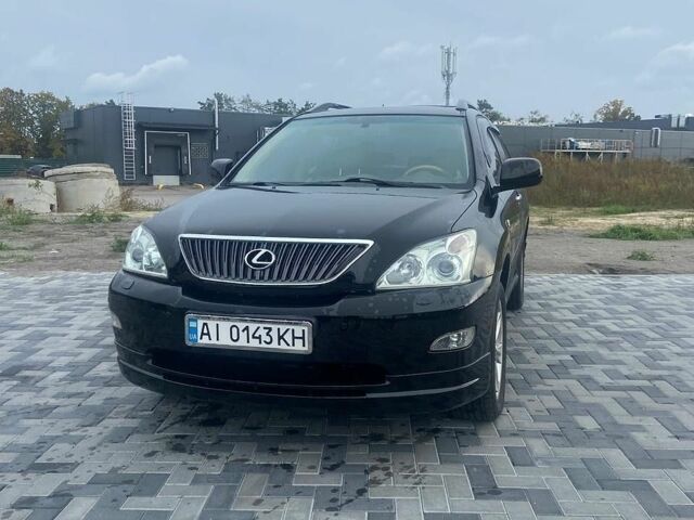 Черный Лексус РХ, объемом двигателя 3.5 л и пробегом 206 тыс. км за 12200 $, фото 1 на Automoto.ua