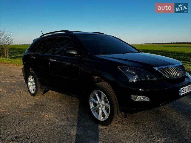 Черный Лексус РХ, объемом двигателя 3.46 л и пробегом 239 тыс. км за 11999 $, фото 2 на Automoto.ua