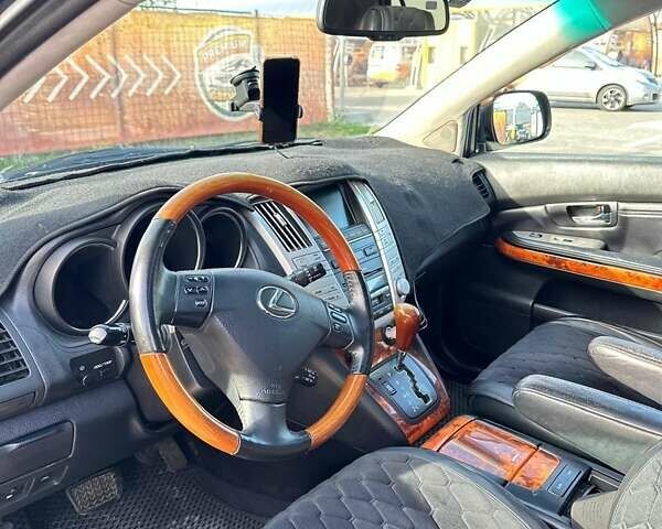 Черный Лексус РХ, объемом двигателя 3.46 л и пробегом 318 тыс. км за 13700 $, фото 11 на Automoto.ua