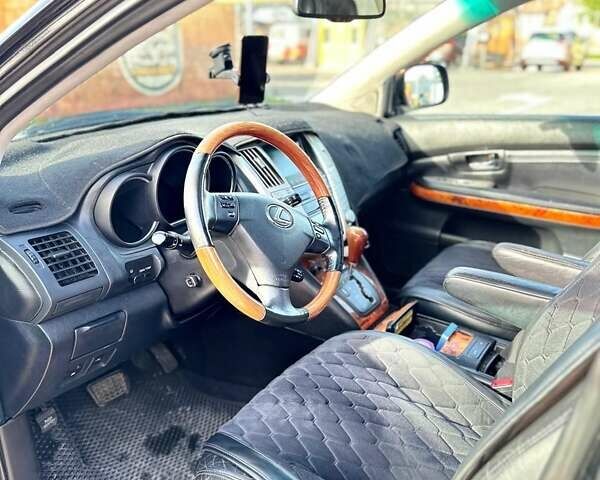 Черный Лексус РХ, объемом двигателя 3.46 л и пробегом 318 тыс. км за 13700 $, фото 4 на Automoto.ua