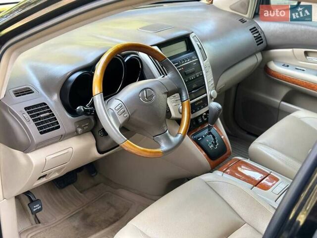 Черный Лексус РХ, объемом двигателя 3.5 л и пробегом 235 тыс. км за 10600 $, фото 2 на Automoto.ua