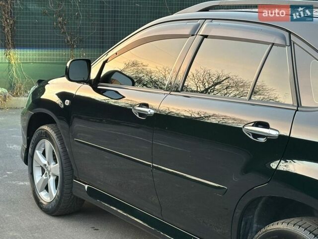 Черный Лексус РХ, объемом двигателя 3.46 л и пробегом 238 тыс. км за 9400 $, фото 32 на Automoto.ua