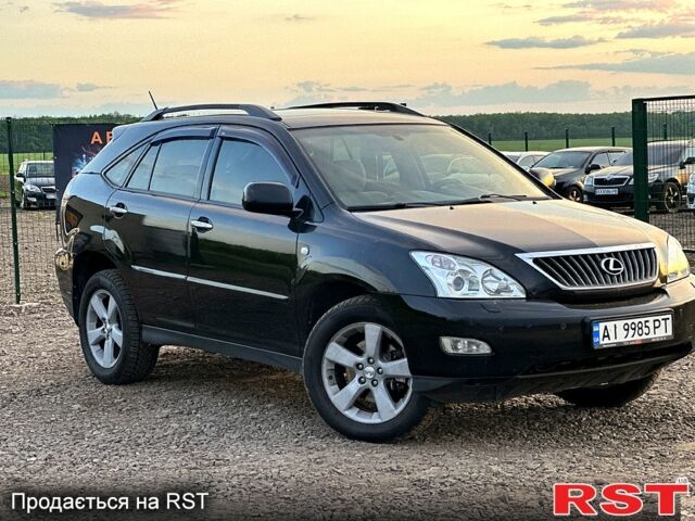 Черный Лексус РХ, объемом двигателя 3.5 л и пробегом 290 тыс. км за 11000 $, фото 2 на Automoto.ua