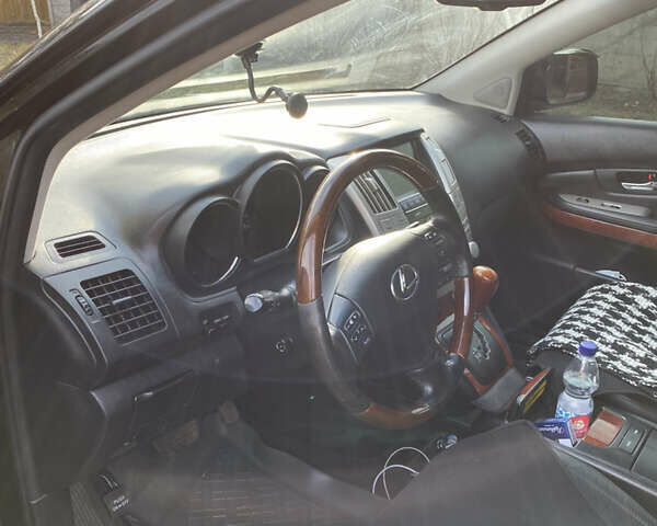 Черный Лексус РХ, объемом двигателя 3.46 л и пробегом 167 тыс. км за 13800 $, фото 7 на Automoto.ua