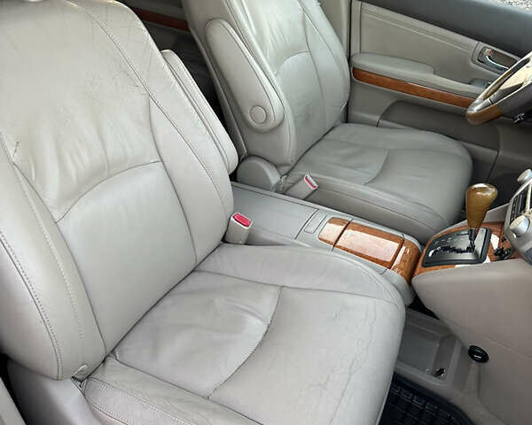 Черный Лексус РХ, объемом двигателя 3.46 л и пробегом 378 тыс. км за 8200 $, фото 7 на Automoto.ua