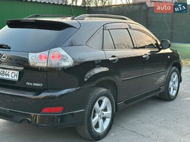 Черный Лексус РХ, объемом двигателя 3.46 л и пробегом 238 тыс. км за 9400 $, фото 26 на Automoto.ua