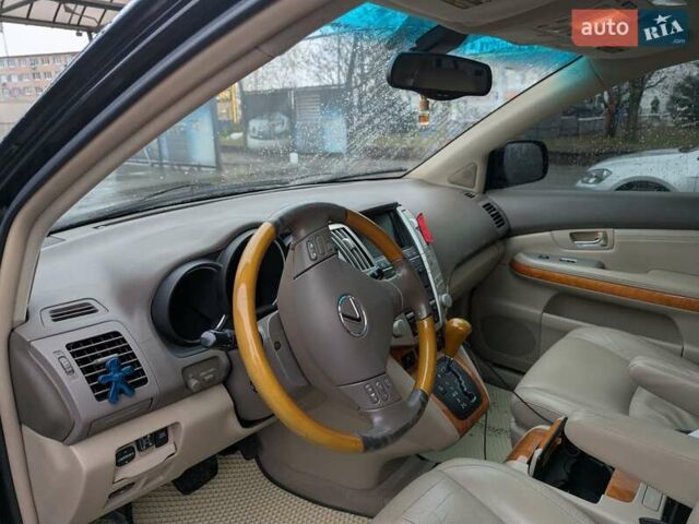 Чорний Лексус РХ, об'ємом двигуна 3.46 л та пробігом 264 тис. км за 11777 $, фото 26 на Automoto.ua