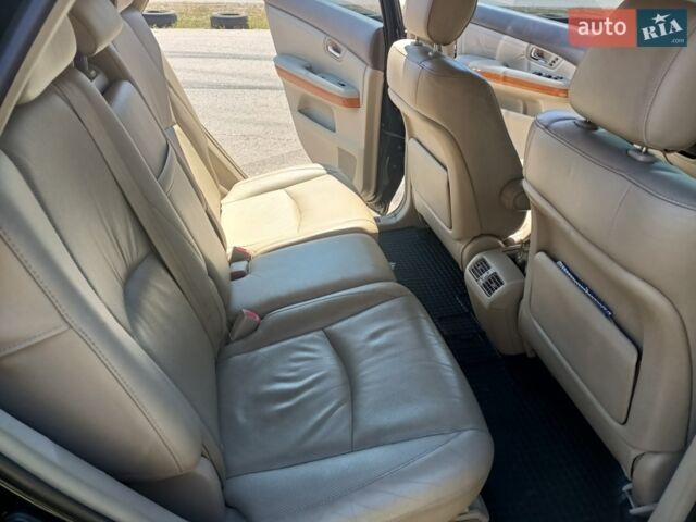 Черный Лексус РХ, объемом двигателя 3.46 л и пробегом 182 тыс. км за 7700 $, фото 2 на Automoto.ua