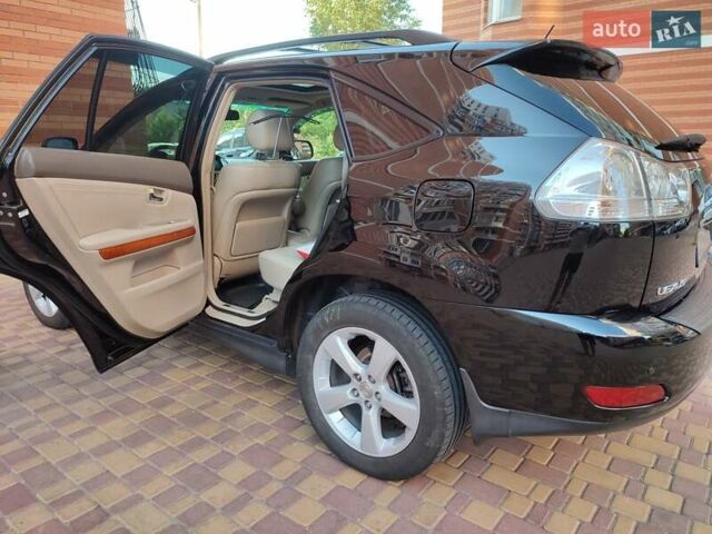 Черный Лексус РХ, объемом двигателя 3.46 л и пробегом 235 тыс. км за 13300 $, фото 6 на Automoto.ua