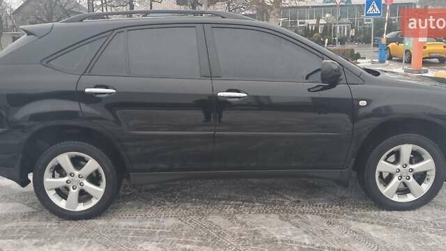Чорний Лексус РХ, об'ємом двигуна 3.46 л та пробігом 195 тис. км за 12700 $, фото 3 на Automoto.ua