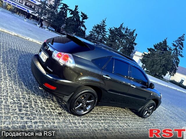 Черный Лексус РХ, объемом двигателя 3.5 л и пробегом 247 тыс. км за 9999 $, фото 5 на Automoto.ua