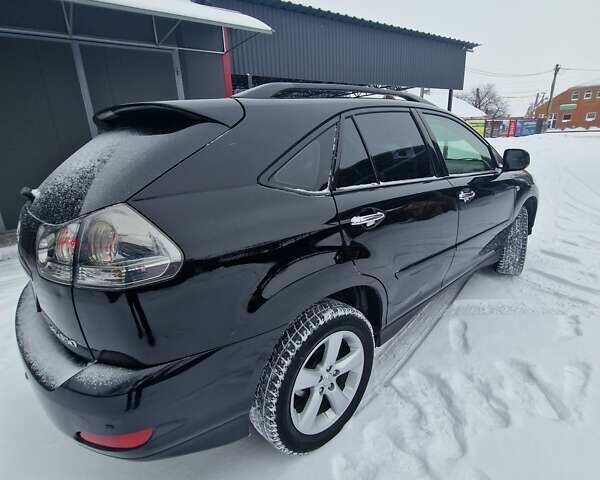 Черный Лексус РХ, объемом двигателя 3.46 л и пробегом 161 тыс. км за 11500 $, фото 13 на Automoto.ua