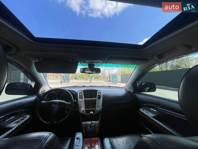 Черный Лексус РХ, объемом двигателя 3.46 л и пробегом 137 тыс. км за 11500 $, фото 15 на Automoto.ua