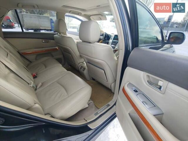 Черный Лексус РХ, объемом двигателя 3.46 л и пробегом 273 тыс. км за 11700 $, фото 18 на Automoto.ua