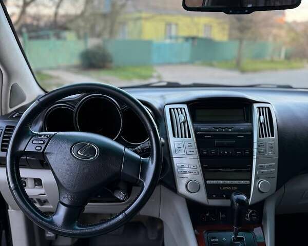 Черный Лексус РХ, объемом двигателя 3.46 л и пробегом 190 тыс. км за 12500 $, фото 58 на Automoto.ua