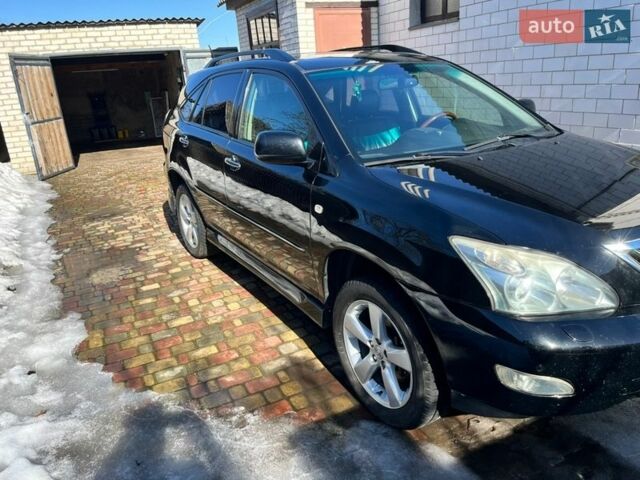 Чорний Лексус РХ, об'ємом двигуна 3.46 л та пробігом 202 тис. км за 10500 $, фото 1 на Automoto.ua