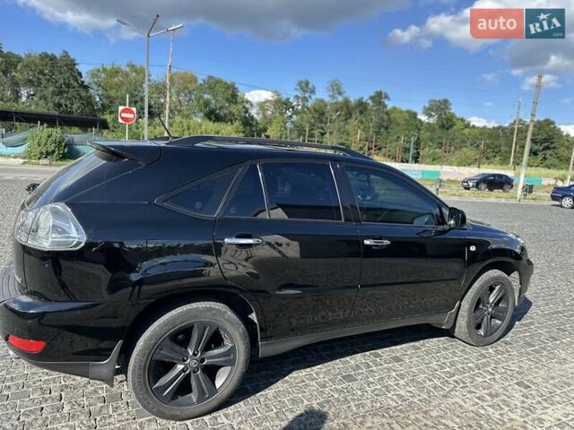 Черный Лексус РХ, объемом двигателя 3.46 л и пробегом 242 тыс. км за 12000 $, фото 1 на Automoto.ua