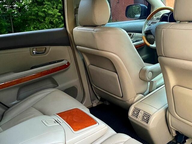 Черный Лексус РХ, объемом двигателя 3 л и пробегом 229 тыс. км за 12900 $, фото 1 на Automoto.ua