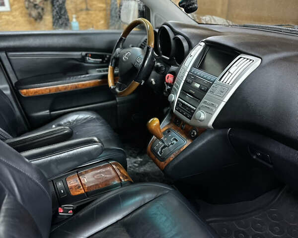 Черный Лексус РХ, объемом двигателя 3.46 л и пробегом 273 тыс. км за 12300 $, фото 14 на Automoto.ua