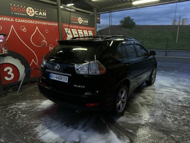 Чорний Лексус РХ, об'ємом двигуна 3 л та пробігом 379 тис. км за 7013 $, фото 2 на Automoto.ua