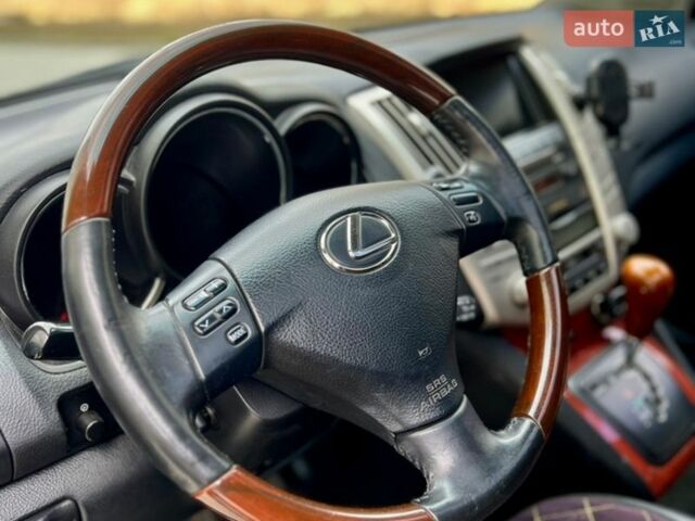Черный Лексус РХ, объемом двигателя 3.5 л и пробегом 260 тыс. км за 12500 $, фото 12 на Automoto.ua