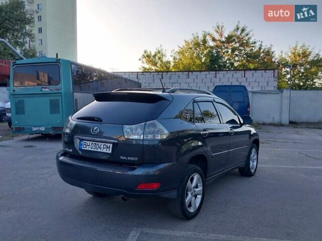 Черный Лексус РХ, объемом двигателя 3.46 л и пробегом 246 тыс. км за 9500 $, фото 5 на Automoto.ua