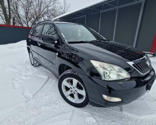 Черный Лексус РХ, объемом двигателя 3.46 л и пробегом 161 тыс. км за 11500 $, фото 16 на Automoto.ua