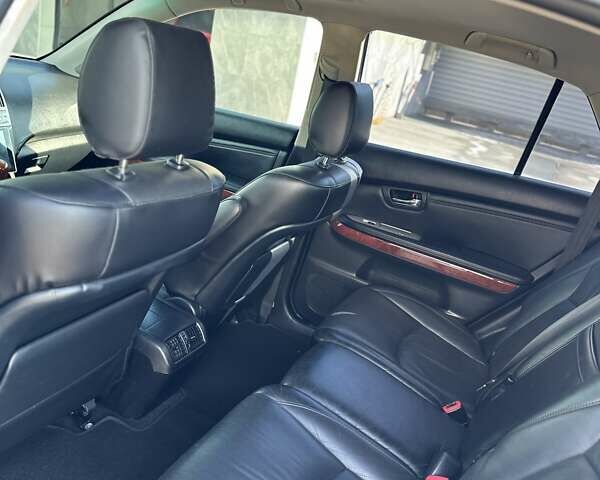 Черный Лексус РХ, объемом двигателя 3.46 л и пробегом 242 тыс. км за 12000 $, фото 4 на Automoto.ua