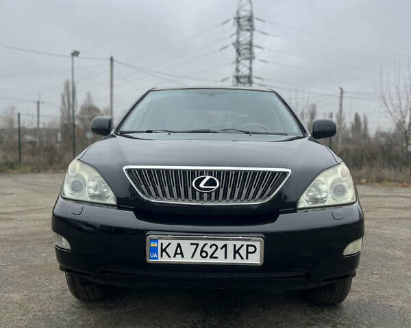 Черный Лексус РХ, объемом двигателя 3.46 л и пробегом 195 тыс. км за 12000 $, фото 1 на Automoto.ua