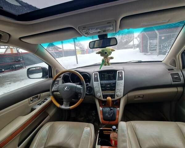 Черный Лексус РХ, объемом двигателя 3.46 л и пробегом 161 тыс. км за 11500 $, фото 18 на Automoto.ua