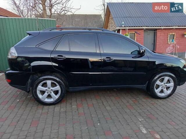 Черный Лексус РХ, объемом двигателя 3.46 л и пробегом 372 тыс. км за 10800 $, фото 26 на Automoto.ua
