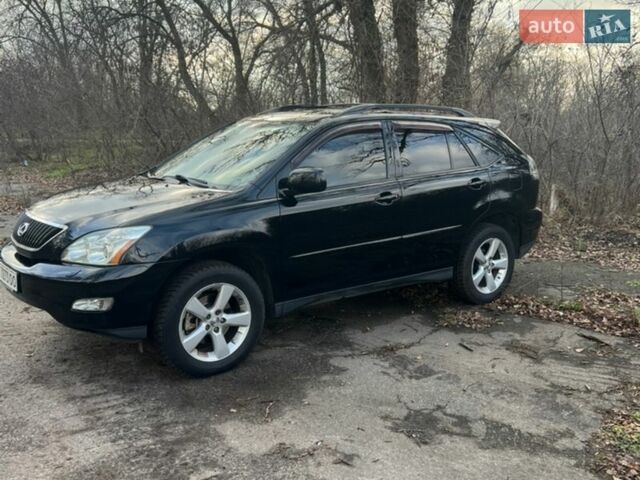 Черный Лексус РХ, объемом двигателя 3.46 л и пробегом 240 тыс. км за 11700 $, фото 1 на Automoto.ua