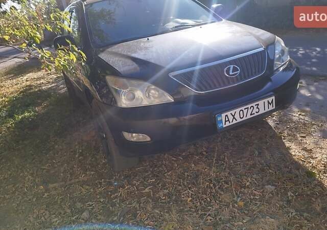 Черный Лексус РХ, объемом двигателя 3.46 л и пробегом 262 тыс. км за 8000 $, фото 1 на Automoto.ua