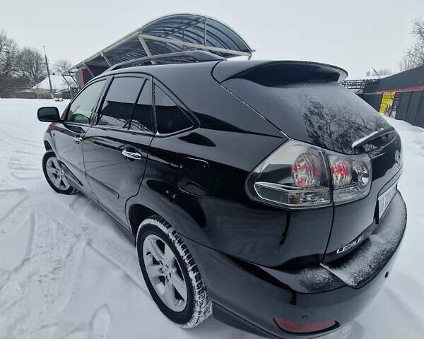 Черный Лексус РХ, объемом двигателя 3.46 л и пробегом 161 тыс. км за 11500 $, фото 11 на Automoto.ua