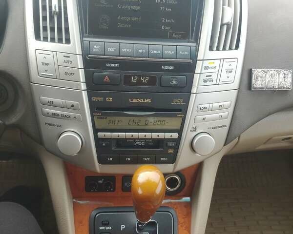 Черный Лексус РХ, объемом двигателя 3.46 л и пробегом 273 тыс. км за 11700 $, фото 23 на Automoto.ua