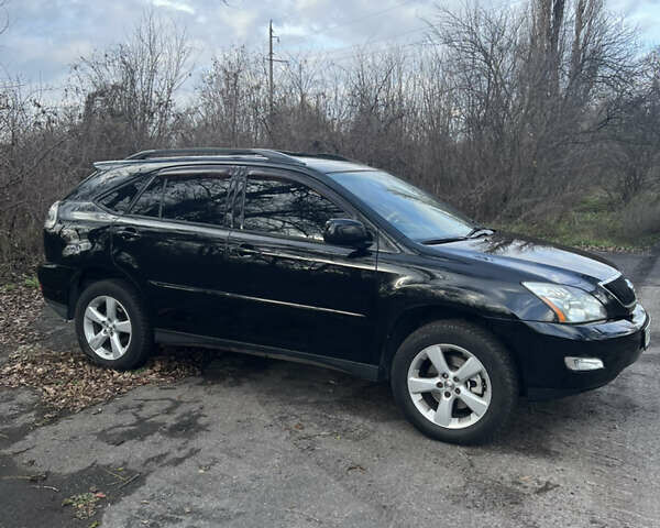 Черный Лексус РХ, объемом двигателя 3.46 л и пробегом 224 тыс. км за 12500 $, фото 2 на Automoto.ua