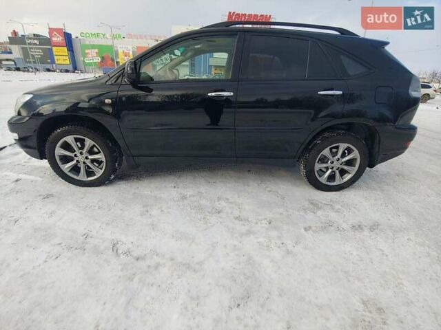 Черный Лексус РХ, объемом двигателя 3.46 л и пробегом 273 тыс. км за 11700 $, фото 4 на Automoto.ua