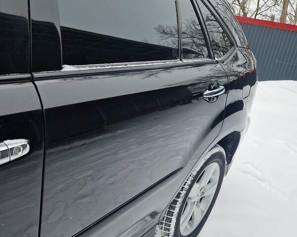 Черный Лексус РХ, объемом двигателя 3.46 л и пробегом 161 тыс. км за 11500 $, фото 3 на Automoto.ua