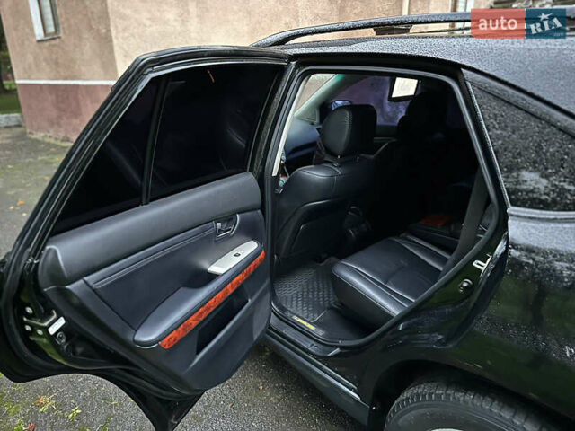 Черный Лексус РХ, объемом двигателя 3.46 л и пробегом 217 тыс. км за 14500 $, фото 21 на Automoto.ua