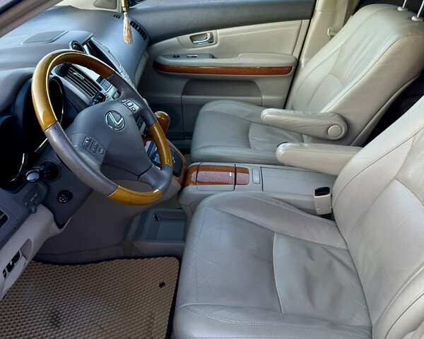 Черный Лексус РХ, объемом двигателя 3.46 л и пробегом 239 тыс. км за 13500 $, фото 23 на Automoto.ua