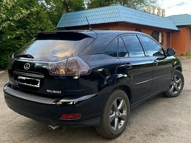 Черный Лексус РХ, объемом двигателя 3 л и пробегом 229 тыс. км за 12900 $, фото 2 на Automoto.ua
